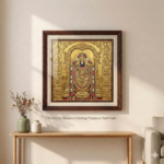 Handcrafted Tanjore painting with gold foil detailing and traditional deity artwork in decorative frame