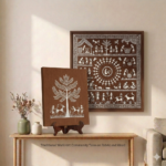 Handcrafted Warli art painting on canvas with tribal figures and traditional patterns displayed on wall